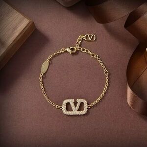 Gold Chain Bracelet with Logo Charm
